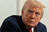 U.S. President Donald Trump speaks to reporters after speaking to troops via video from his Mar-a-Lago estate on Thanksgiving, Thursday, Nov. 27, in Palm Beach, Florida. [AP/YONHAP]