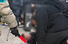 Two passengers who were waiting for a train at a subway platform in Gimpo International Airport Station in western Seoul restrain a man who threatened a safety officer with a knife on Feb. 4. [SCREEN CAPTURE]