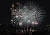 Fireworks light up city skyline with dramatic colors, demon hunters ...