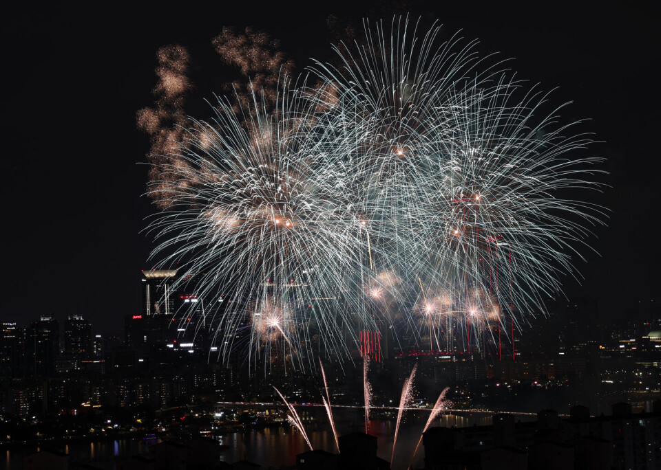 September Fireworks Fireworks light up city skyline with dramatic colors, demon hunters ...