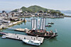 A replica ship of the Joseon Tongsinsa, a diplomatic delegation sent by the Joseon Dynasty (1392-1910) to Japan, docks at a port in Osaka, western Japan, on May 11, 2025, on its 13-day voyage from the southeastern port city of Busan, Korea, as part of events to mark the 60th anniversary this year of diplomatic ties between the two neighboring countries, in this photo released by the National Research Institute of Maritime Heritage. [YONHAP]