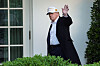 U.S. President Donald Trump walks down the colonnade to the Oval Office after arriving on Marine One at the White House in Washington on April 27. [REUTERS/YONHAP]