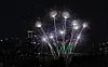 Fireworks light up city skyline with dramatic colors, demon hunters ...