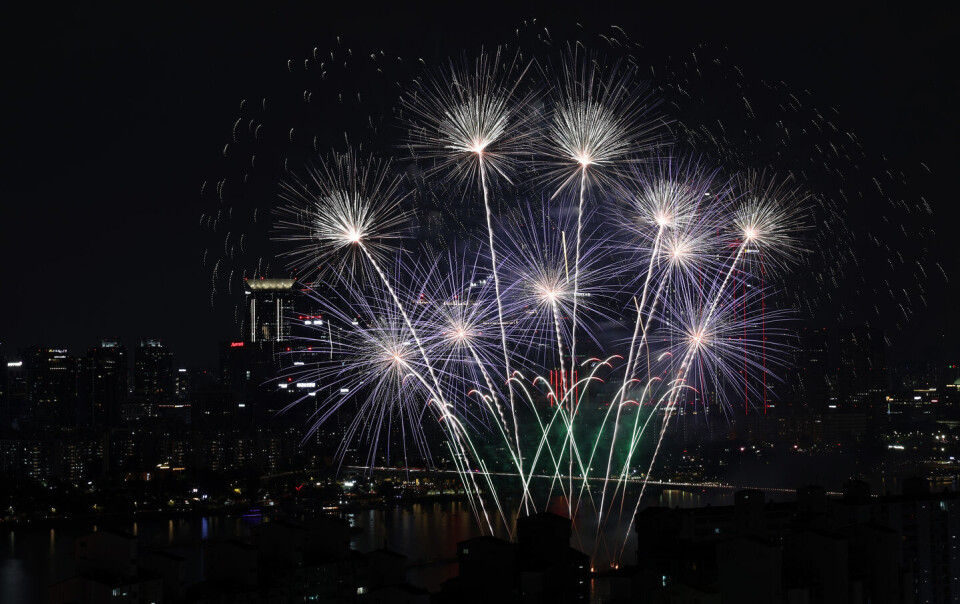 September Fireworks Fireworks light up city skyline with dramatic colors, demon hunters ...