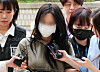 A suspect surnamed Yang, accused of attempting to extort money from Tottenham Hotspur captain Son Heung-min, appears at Seoul Central District Court in southern Seoul on May 17. [NEWS1]
