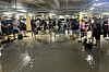 Residents finish cleaning up the basement of an apartment complex in western Gyeonggi.  [JIM BULLEY]