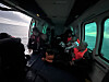 Crew members who fell overboard from a cargo ship off the southern coast of Seogwipo, Jeju, are seen inside a helicopter after being rescued by the Seogwipo Coast Guard on Dec. 12. [SEOGWIPO COAST GUARD]