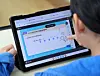 A student studies math using an AI digital textbook during a demonstration class at an elementary school in Chuncheon, Gangwon, on May 7. [YONHAP]