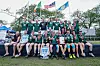 Seoul Gaels in Kuala Lumpur, Malaysia. Kim Na-na, center in the middle row, cheers alongside her teammates. [TOM COYNER]