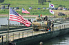 A South Korean Army vehicle crosses a floating bridge on the Namhan River during a combined river-crossing drill between South Korea and the United States as a part of Ulchi Freedom Shield 25 in Yeoju, Gyeonggi, on Aug. 27. [AP/YONHAP]