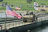 A South Korean Army vehicle crosses a floating bridge on the Namhan River during a combined river-crossing drill between South Korea and the United States as a part of Ulchi Freedom Shield 25 in Yeoju, Gyeonggi, on Aug. 27. [AP/YONHAP]