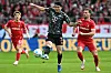 Bayern Munich defender Kim Min-jae, center, vies for the ball during a Bundesliga match against SC Freiburg in Freiburg, Germany, on Jan. 25. [AFP/YONHAP]