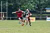 A member of the Seoul Gaels men's side, center, breaks through on the pitch. [TOM COYNER]