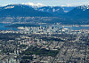 An aerial view shows the city of Vancouver lying below the Coast Mountains range in Vancouver, British Columbia, Canada, on Feb. 26, 2025.  [REUTERS/YONHAP]