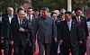 Russian President Vladimir Putin, left, Chinese President Xi Jinping, center, North Korean leader Kim Jong-un, right, and heads of foreign delegations emerge onto a rostrum in Tiananmen Square, Beijing, China, on Sept. 3. [UPI/YONHAP]
