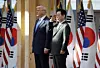 South Korean President Lee Jae Myung, right, and U.S. President Donald Trump attend a welcome ceremony for the U.S. leader ahead of their talks at the National Museum in Gyeongju, North Gyeongsang, on Oct. 29. [EPA/YONHAP]
