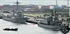 A U.S. Navy destroyer, left, and a Japan Maritime Self-Defense Force escort ship arrive at Busan Naval Operations Base on May 29, 2023, to take part in a multinational exercise with Korea, the United States, Japan and Australia. [SONG BONG-GEUN]