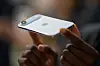 A person holds an iPhone Air during Apple's ″Awe-Dropping″ event at the Steve Jobs Theater at Apple Park in Cupertino, California, on Sept. 9. [AFP/YONHAP]