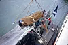 A wounded soldier being transported onto Jutlandia from a helicopter. [DANISH JUTLANDIA VETERANS]