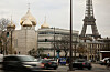The Holy-Trinity Russian orthodox Cathedral and the adjoining culture center, right, are seen next to the Eiffel Tower in Paris on Nov. 26. [AP/YONHAP]