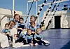 Danish nurses on board the Jutlandia with young Korean civilians who received medical treatment on the vessel. [DANISH JUTLANDIA VETERANS]
