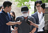 The 69-year-old driver surnamed Cha, who was convicted for driving a vehicle into a sidewalk near Seoul City Hall on July 1, 2024, killing nine people, walks into Seoul Central District Court in Seocho District, western Seoul, on Feb. 12. [NEWS1]