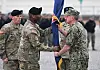 Incoming commander General Xavier T. Brunson, second from left, receives the United States Forces Korea flag from US Navy admiral Samuel John Paparo, right, commander of United States Indo-Pacific Command, during a change-of-command ceremony for the United Nations Command, Combined Forces Command, and United States Forces Korea at Camp Humphreys in Pyeongtaek on Dec. 20, 2024. [AFP/YONHAP]
