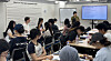 International students listen to a lecture on legal and administrative information during the Seoul Metropolitan Government’s “30 Days in Seoul” program at the city’s youth startup support center in Seodaemun District, western Seoul, on July 7. [CHO JUNG-WOO]