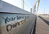 A message discouraging suicide is written in English along the post of Mapo Bridge in Seoul on Feb. 27. [YONHAP]