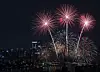 Fireworks light up city skyline with dramatic colors, demon hunters ...