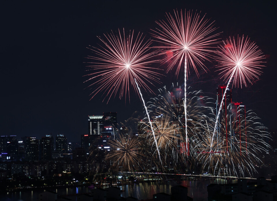 September Fireworks Fireworks light up city skyline with dramatic colors, demon hunters ...