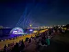 People watch a performance near the Han River in an undated photo provided by the Seoul city government on Thursday. [SEOUL METROPOLITAN GOVERNMENT]