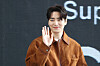 Actor Lee Jun-hyuk waves to his fans during an open talk session for Tving series ″Dongjae, the Good or the Bastard″ (2024) held during the Busan International Film Festival on Oct. 5, 2024. [YONHAP]