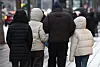 Passersby in puffers walk the streets of Jongno District, downtown Seoul, on Sunday afternoon. The Korea Meteorological Administration (KMA) issued a cold wave advisory in Seoul for 9 p.m. Sunday for the first time this year. [NEWS1]