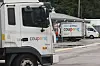 The photo shows vehicles coming and going at a Coupang logistics center in Seoul on Aug. 6. [YONHAP]