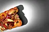 High-calorie foods can lead to obesity. However, no food has an overpowering level of addictiveness. [SHUTTERSTOCK]