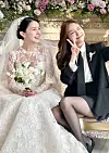 Minah of K-pop girl group Girl's Day attends her sister's wedding wearing a black get-up. [SCREEN CAPTURE]