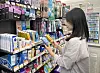 A customer shops at a convenience store in Seoul. [BGF RETAIL]