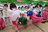 Children play jegi chagi (Korean hacky sack) in Seocho District, southern Seoul, on Sept. 5, 2022. [YONHAP]