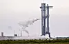 A SpaceX Super Heavy booster carrying the Starship spacecraft vents before the launch is scrubbed to allow for troubleshooting of a ground issue at the company's launch complex in Starbase, Texas, on Aug. 24. [REUTERS/YONHAP]