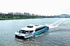 A Hangang Bus operates near Yeongdong Bridge in Seoul on July 1, the first day of its trial service. [YONHAP]