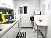A shared kitchen at Ines Bengochea's gosiwon (small, affordable single-room housing) [INES BENGOCHEA]