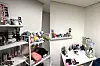 Plushies and action figures are displayed at Mariia Hrabovska's gosiwon (small, affordable single-room housing) room [MARIIA HRABOVSKA]