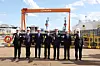 President Lee Jae Myung takes photos with Hanwha officials at Hanwha Philly Shipyard in Philadelphia on Aug. 26. [YONHAP]