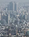 An apartment complex and villas in central Seoul are seen from Mount Namsan on Feb. 2. [YONHAP]
