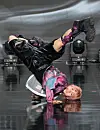 Member Hong Min-sung of boy band Newbeat pulls off b-boy moves during the band's debut showcase held on March 24 at the Ilchi Art Hall in southern Seoul. [NEWS1]