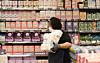 An employee organizes menstrual products at a supermarket in Seoul on Oct. 4, 2020. [NEWS1]