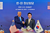 President Lee Jae Myung and U.S. President Donald Trump shake hands ahead of their summit at the Gyeongju National Museum in North Gyeongsang on Oct. 29. [PRESIDENTIAL OFFICE]