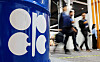 People walk past an installation depicting barrel of oil with the logo of Organization of the Petroleum Exporting Countries (OPEC) during the COP29 United Nations climate change conference in Baku, Azerbaijan on Nov. 19, 2024. [REUTERS/YONHAP]