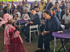 Dr. Jennifer Geerlings-Simons listens to a girl sing at a party in Paramaribo, Suriname, July 6, after being appointed Suriname's first female president. [AP/YONHAP]